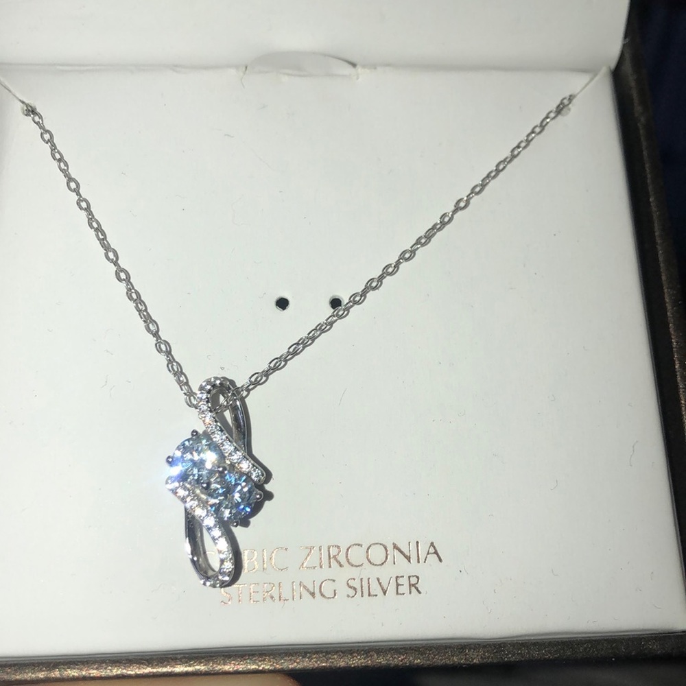New in box. Sterling silver two stone CZ necklace